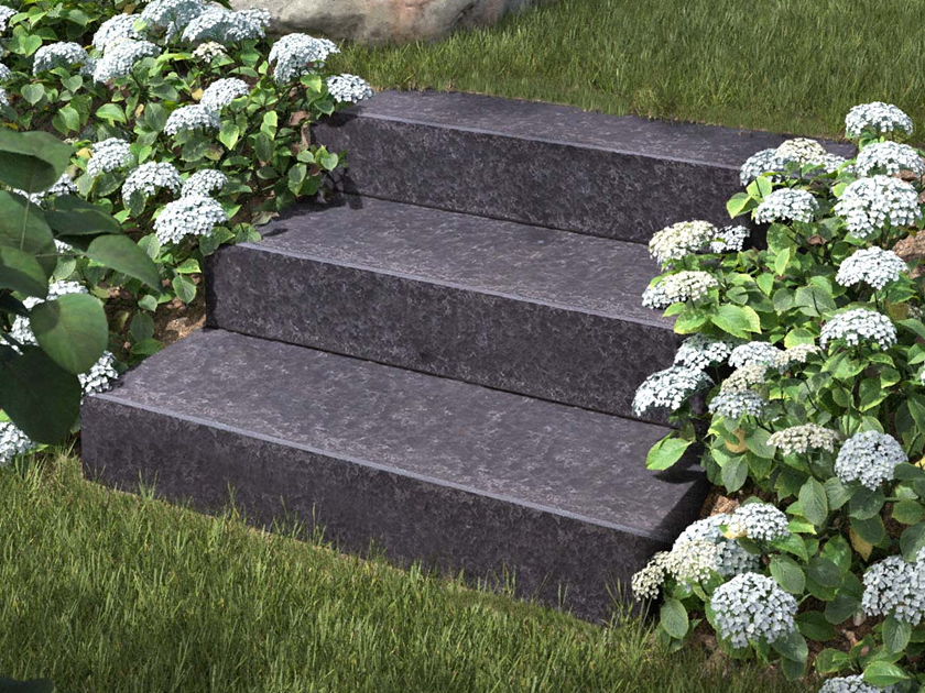 Takeda basalt muurblokken met bloemen en gras