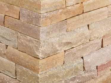 Muurbekleding kwartsiet Irish Gold op maat gezaagd