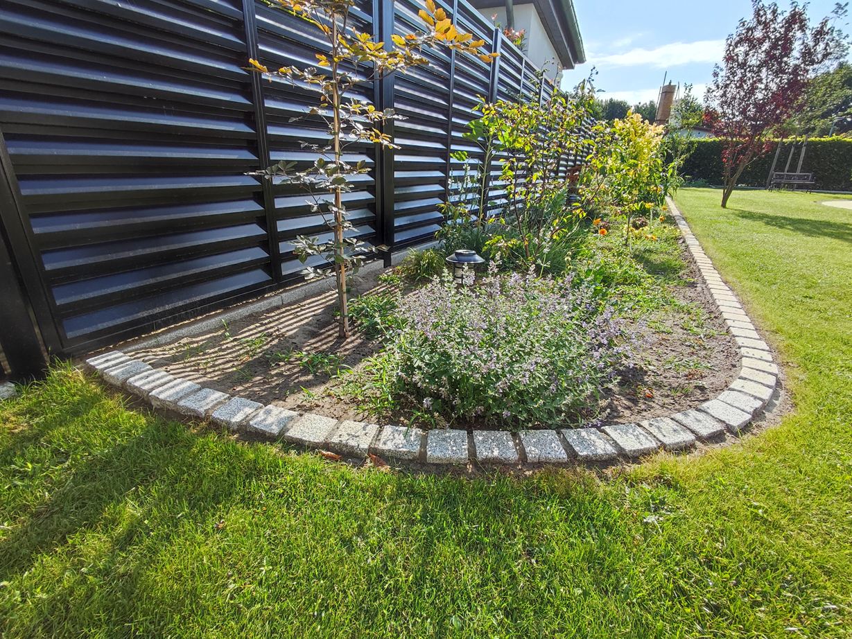 Ronde bestrating als bedrand