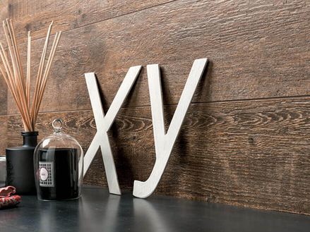 Woonkamer decoratie en muur met Indie Nova porcellanato tegels