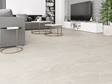 Woonkamer met leisteenlook Canyon Gold keramische tegels