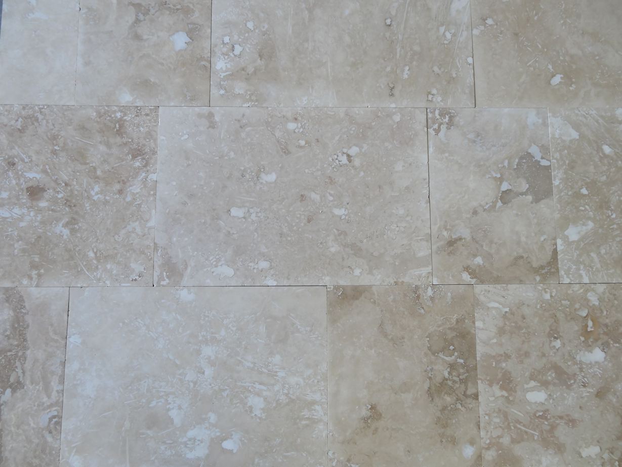 Natuursteentegels kant-en-klaar gelegd als plaatmateriaal